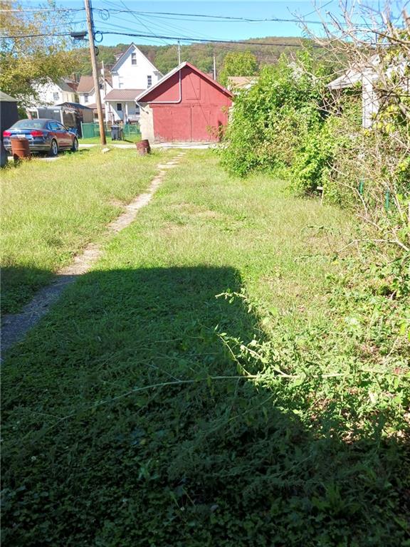 633 5th Avenue Ford City, PA 16226 - Photo 2 of 18 a view of a house with a yard