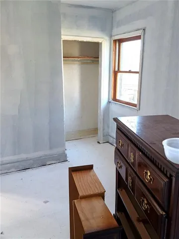 a view of an empty room and window