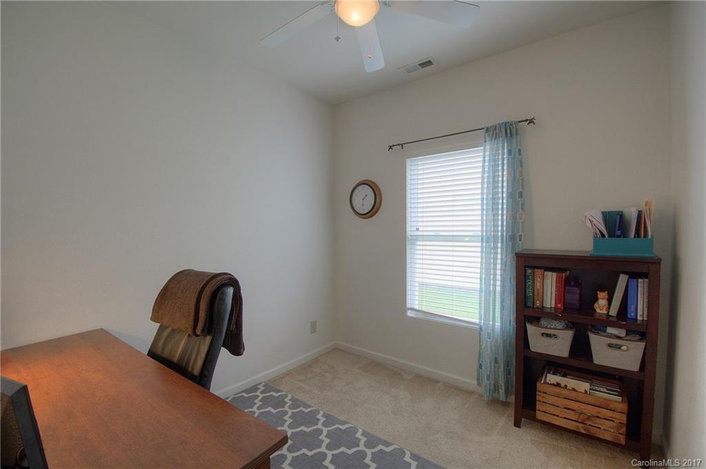 2013 Durand Road Fort Mill, SC 29715 - Photo 11 of 24 a bedroom with furniture and a window