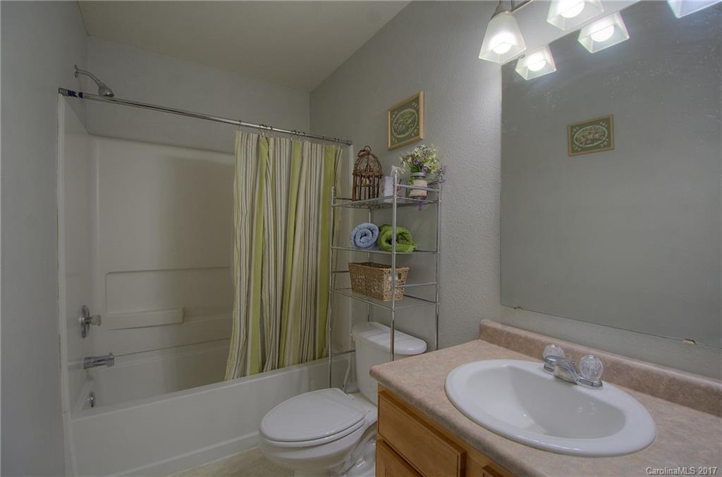 2013 Durand Road Fort Mill, SC 29715 - Photo 15 of 24 a bathroom with a sink toilet and shower