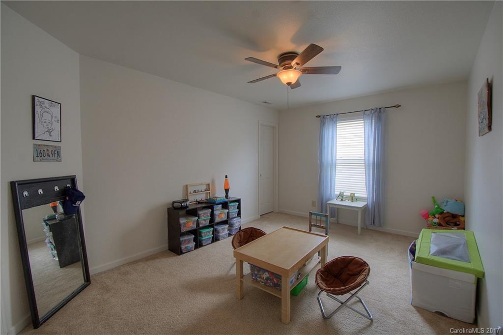 2013 Durand Road Fort Mill, SC 29715 - Photo 17 of 24 a living room with furniture and a window