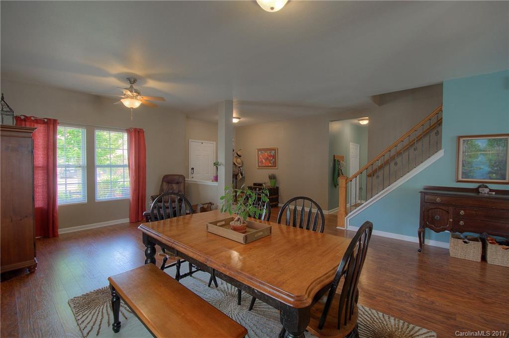 2013 Durand Road Fort Mill, SC 29715 - Photo 5 of 24 a view of a dining room with furniture window and wooden floor