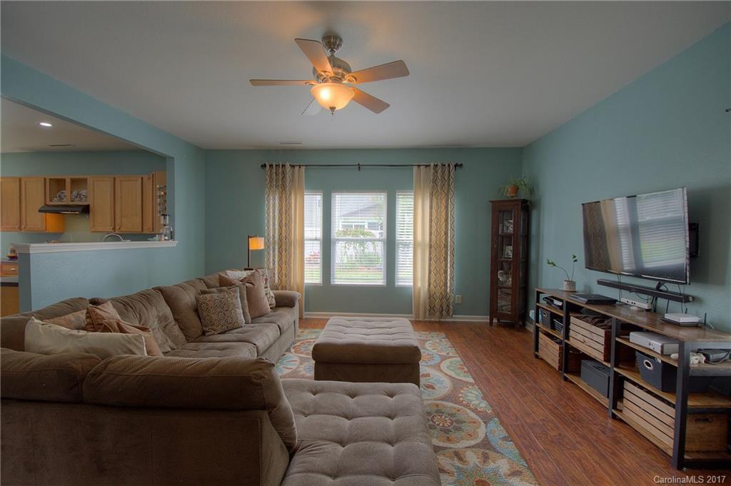 2013 Durand Road Fort Mill, SC 29715 - Photo 6 of 24 a living room with furniture and a flat screen tv