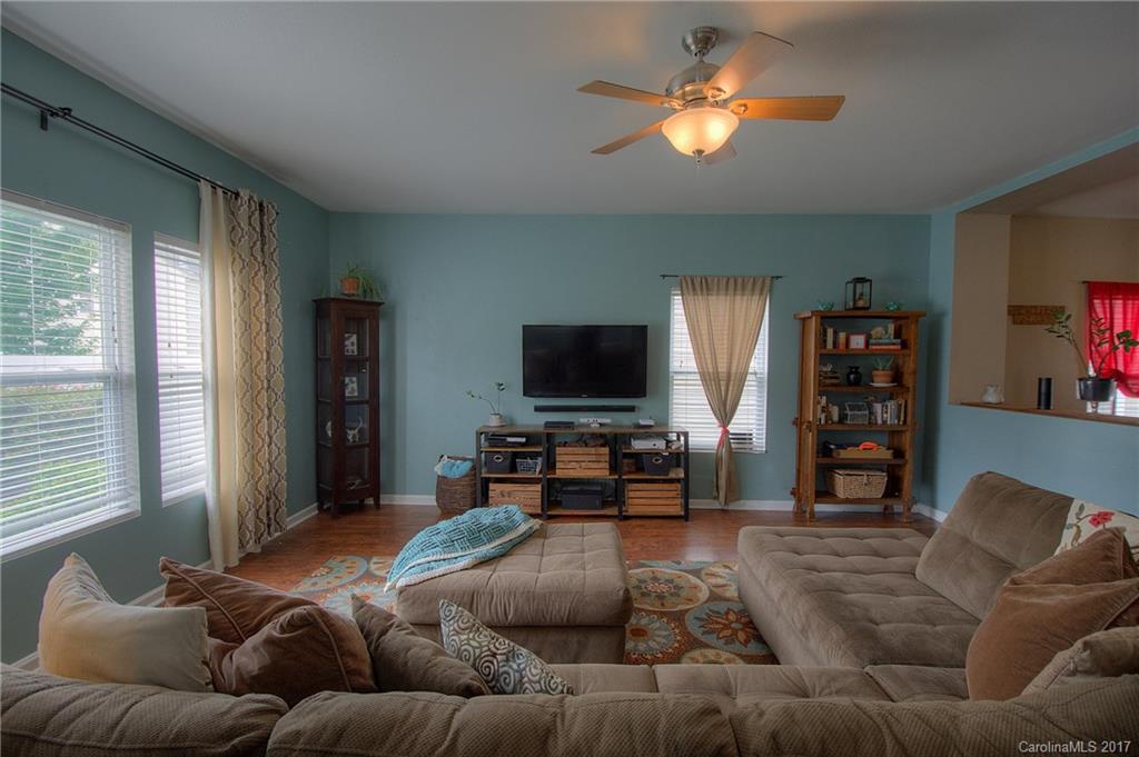 2013 Durand Road Fort Mill, SC 29715 - Photo 7 of 24 a living room with furniture and a flat screen tv