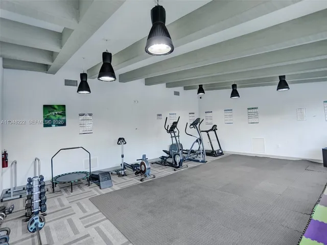 a view of a room with gym equipment