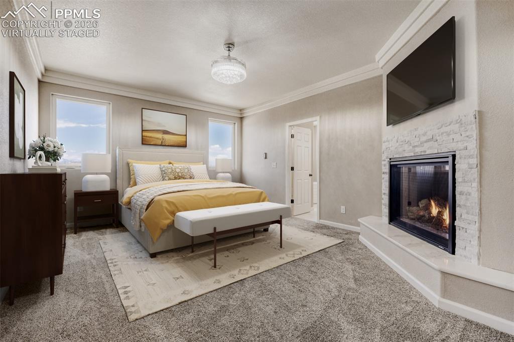 13680 Woodlake Road Elbert, CO 80106 - Photo 18 of 47 Virtually staged primary Bedroom with fireplace, massive closet, lux 5-piece bath