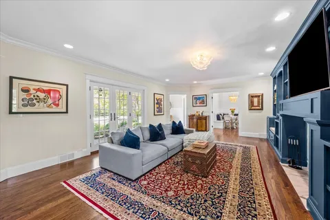 a living room with furniture and a rug