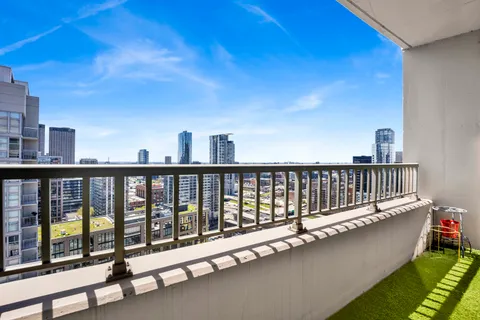 a balcony with yard