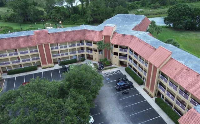 a view of a street with a building in the background