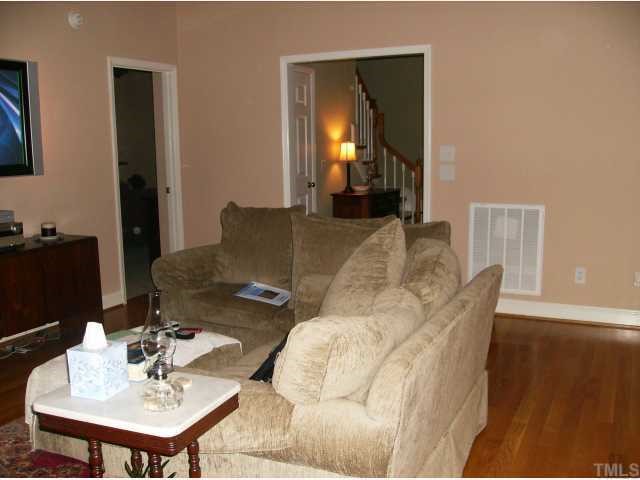 340 Oaks Lane Road Timberlake, NC 27583 - Photo 5 of 9 a living room with furniture and a table
