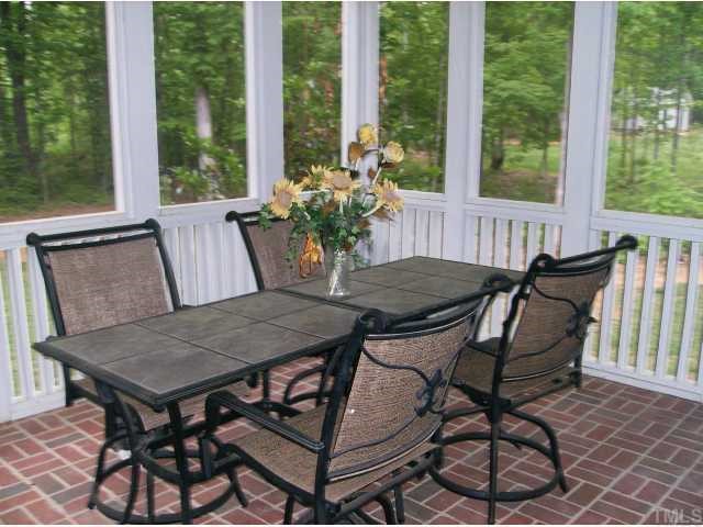 340 Oaks Lane Road Timberlake, NC 27583 - Photo 7 of 9 a view of a outdoor seating area with furniture