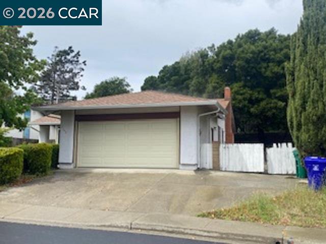 2152 Blue Jay Circle Pinole, CA 94564 - Photo 1 of 31 a view of a house with a garage