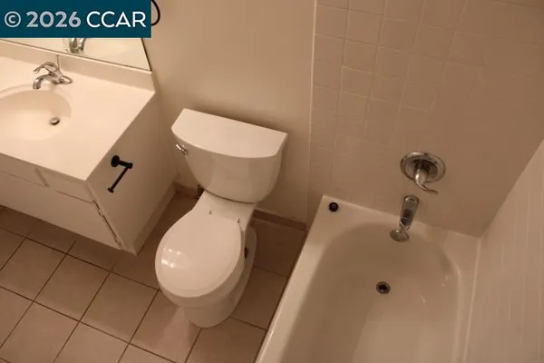 a bathroom with a toilet and a sink