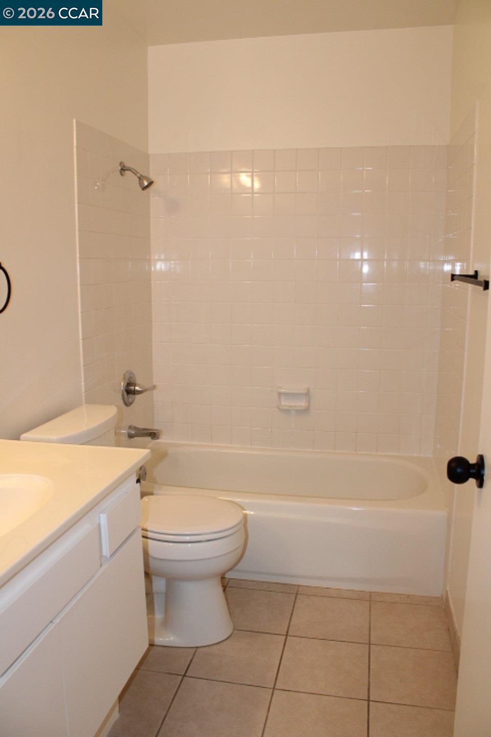 2152 Blue Jay Circle Pinole, CA 94564 - Photo 17 of 31 a bathroom with a sink a toilet and shower