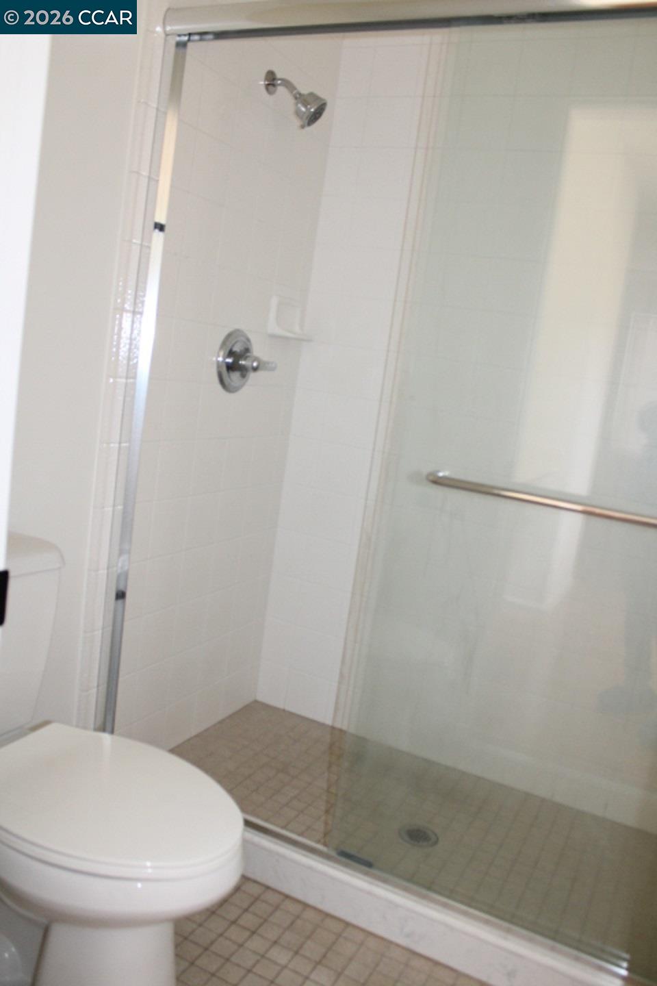 2152 Blue Jay Circle Pinole, CA 94564 - Photo 23 of 31 a bathroom with a toilet and a shower