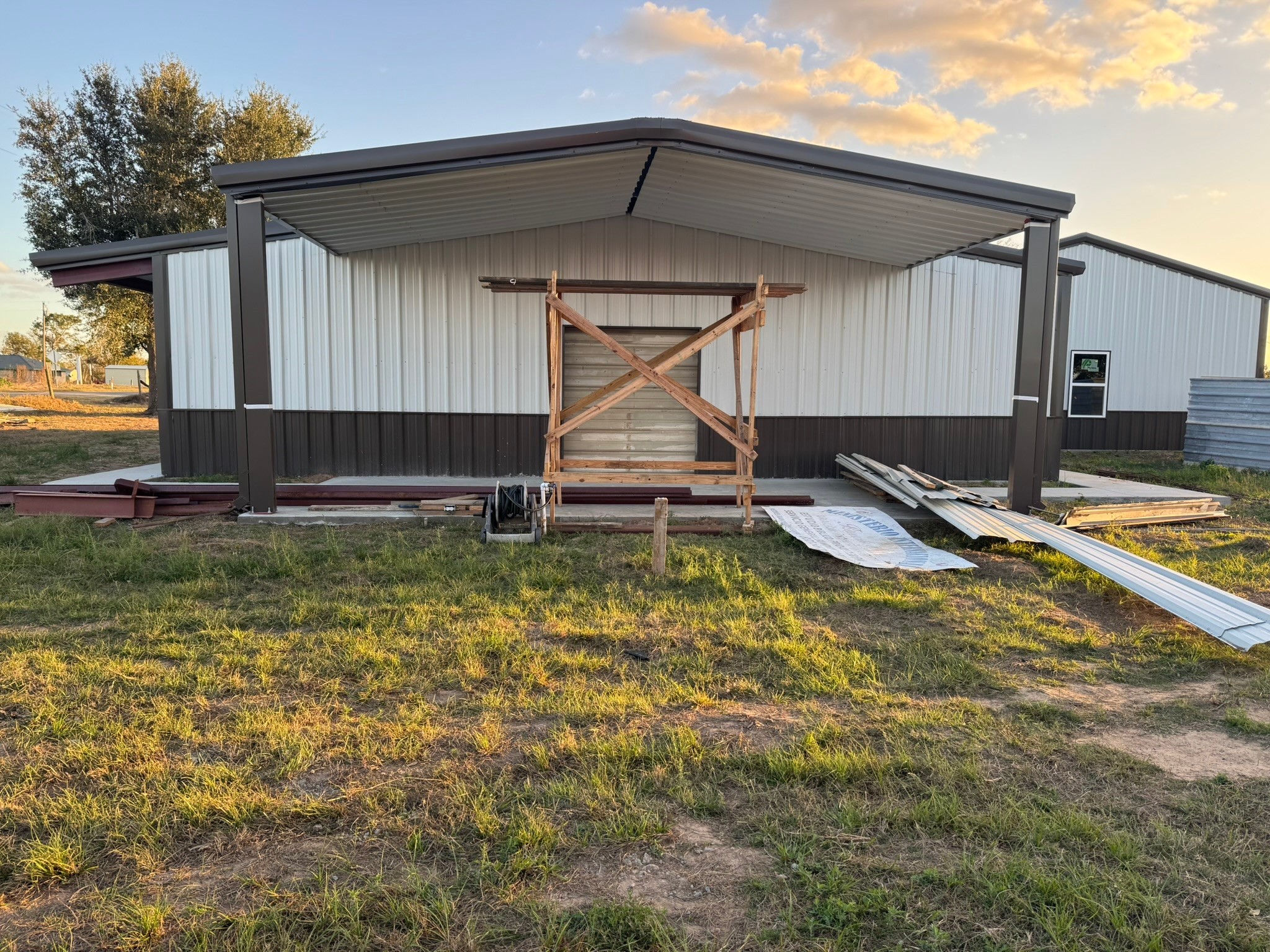 13591 Cochran Road Waller, TX 77484 - Photo 2 of 10 a view of a backyard with chair and table in the patio