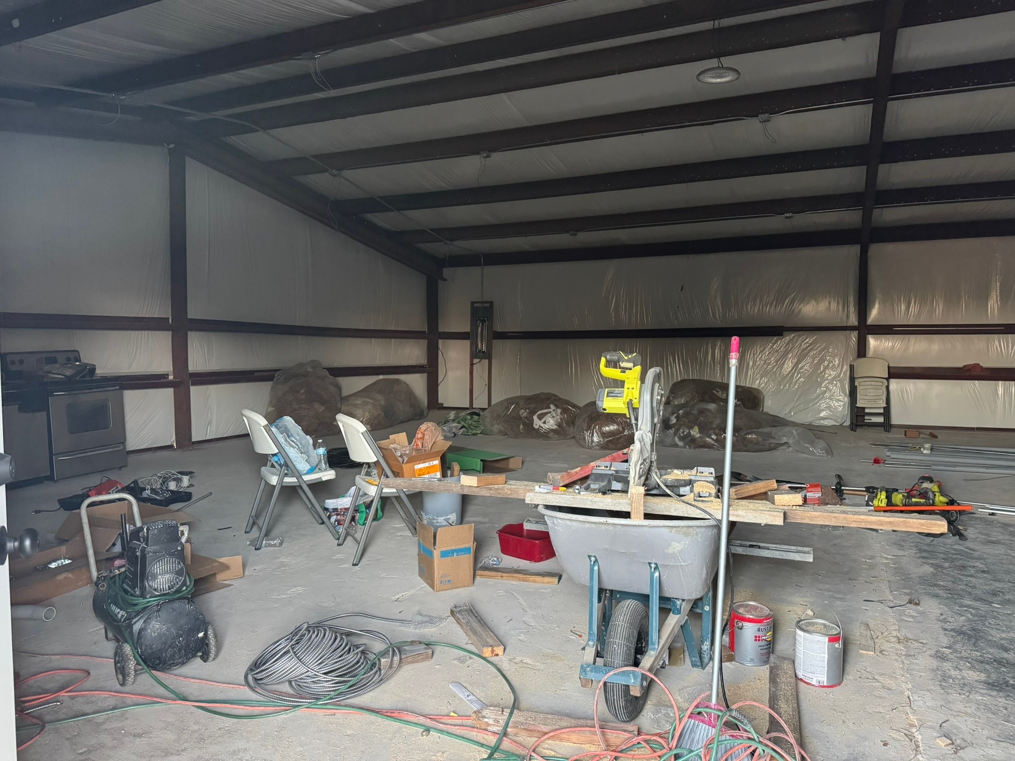 13591 Cochran Road Waller, TX 77484 - Photo 6 of 10 a dining room with furniture and a kitchen view