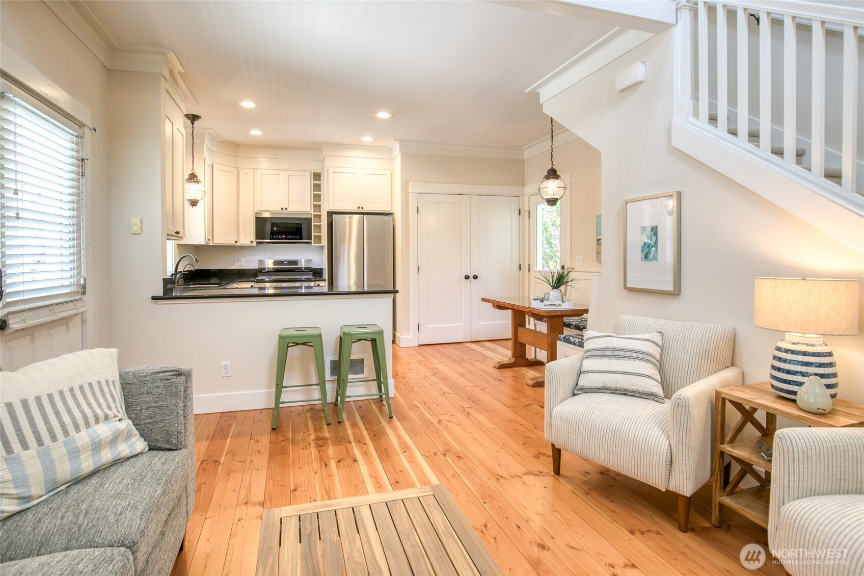 191 Compass Street Pacific Beach, WA 98571 - Photo 11 of 36 a living room with furniture and a wooden floor