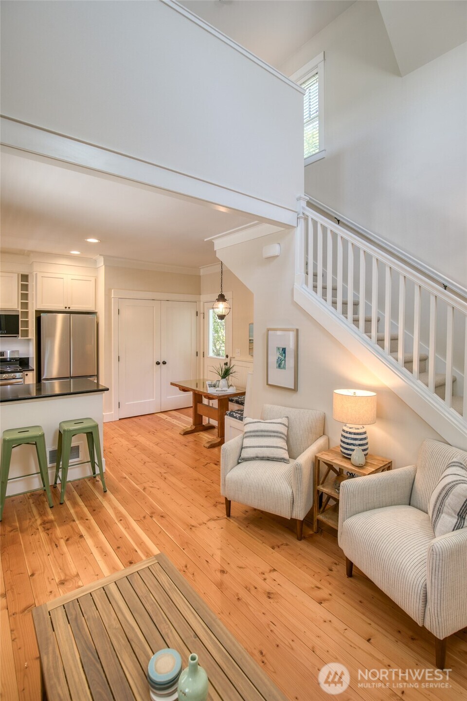 191 Compass Street Pacific Beach, WA 98571 - Photo 16 of 36 a living room with furniture and a table