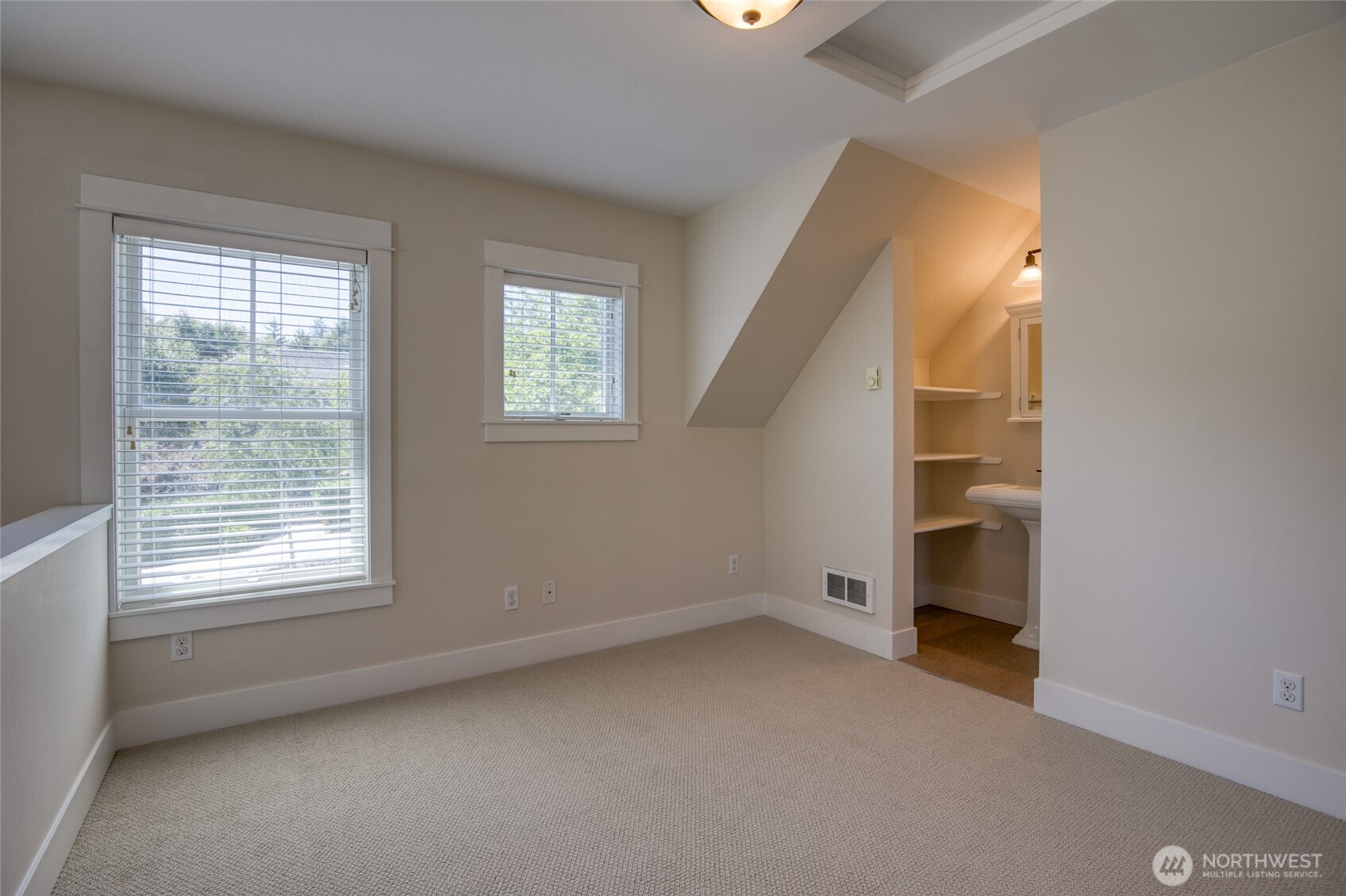 191 Compass Street Pacific Beach, WA 98571 - Photo 19 of 36 an empty room with windows