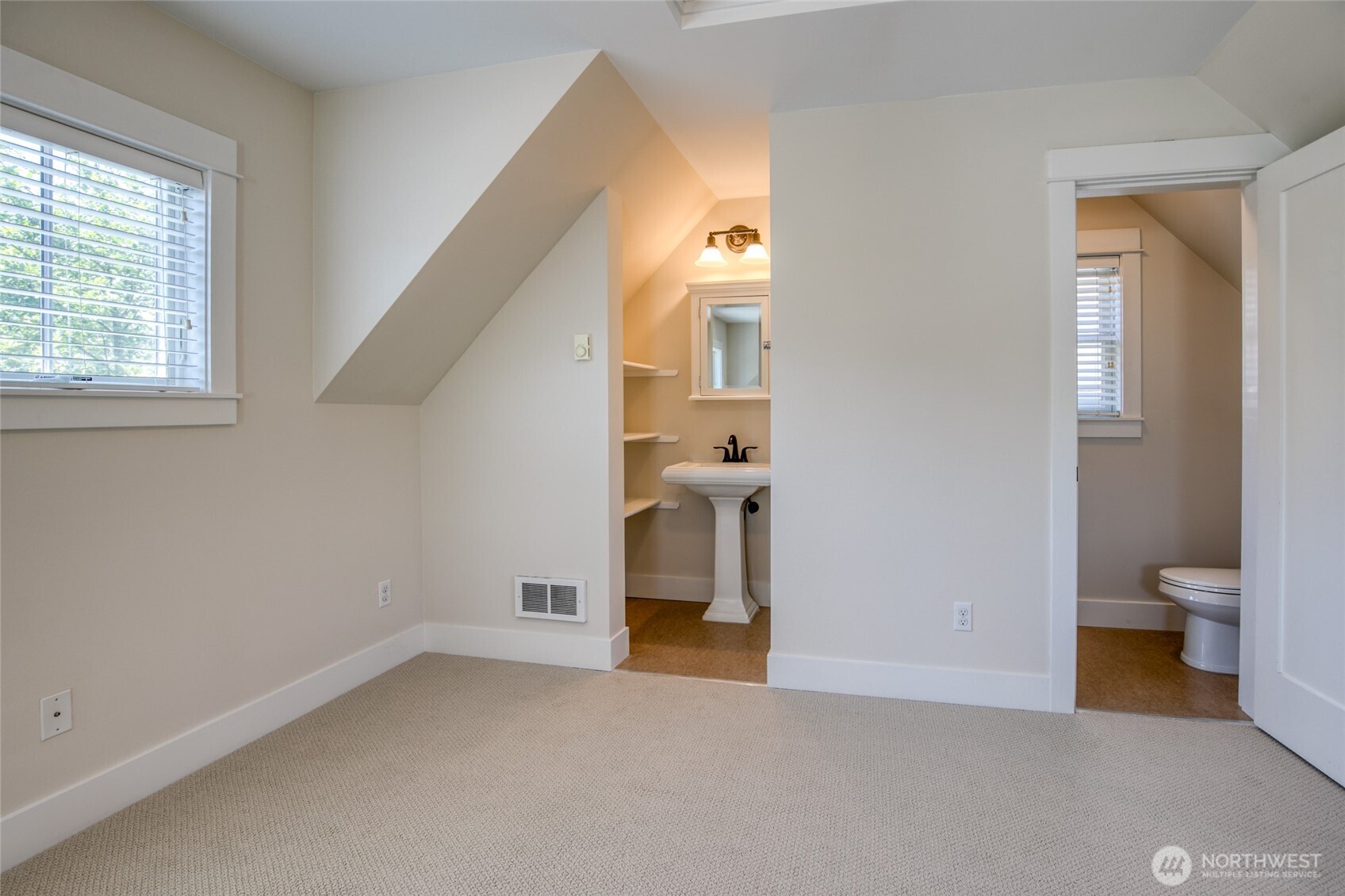 191 Compass Street Pacific Beach, WA 98571 - Photo 20 of 36 an empty room and a bathroom with a window