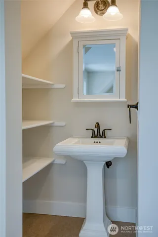 a bathroom with a bath tub