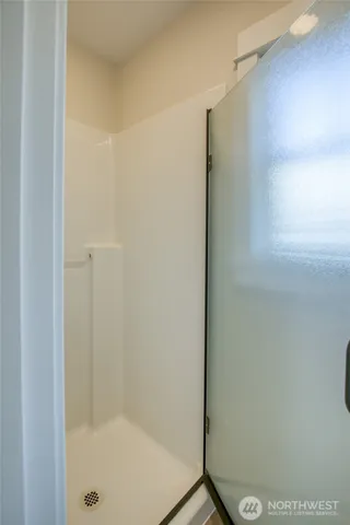a utility room with sink dryer and washer
