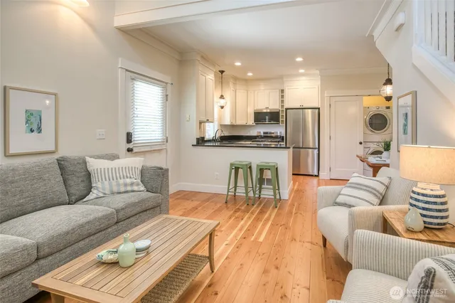 a living room with furniture and a table