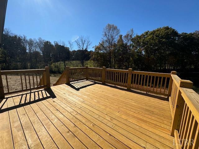2211 Spg Grv Road Spout Spring, VA 24593 - Photo 18 of 24 a view of balcony with wooden floor and outdoor space