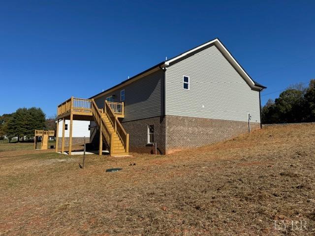 2211 Spg Grv Road Spout Spring, VA 24593 - Photo 6 of 24 a front view of a house with a yard