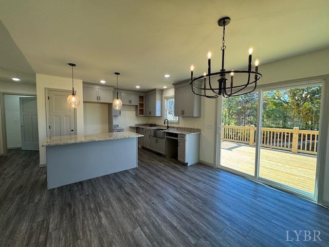 2211 Spg Grv Road Spout Spring, VA 24593 - Photo 10 of 24 an open kitchen with wooden floor and stainless steel appliances