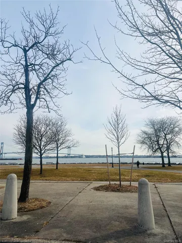a kitchen with stainless steel appliances a refrigerator and a stove top oven