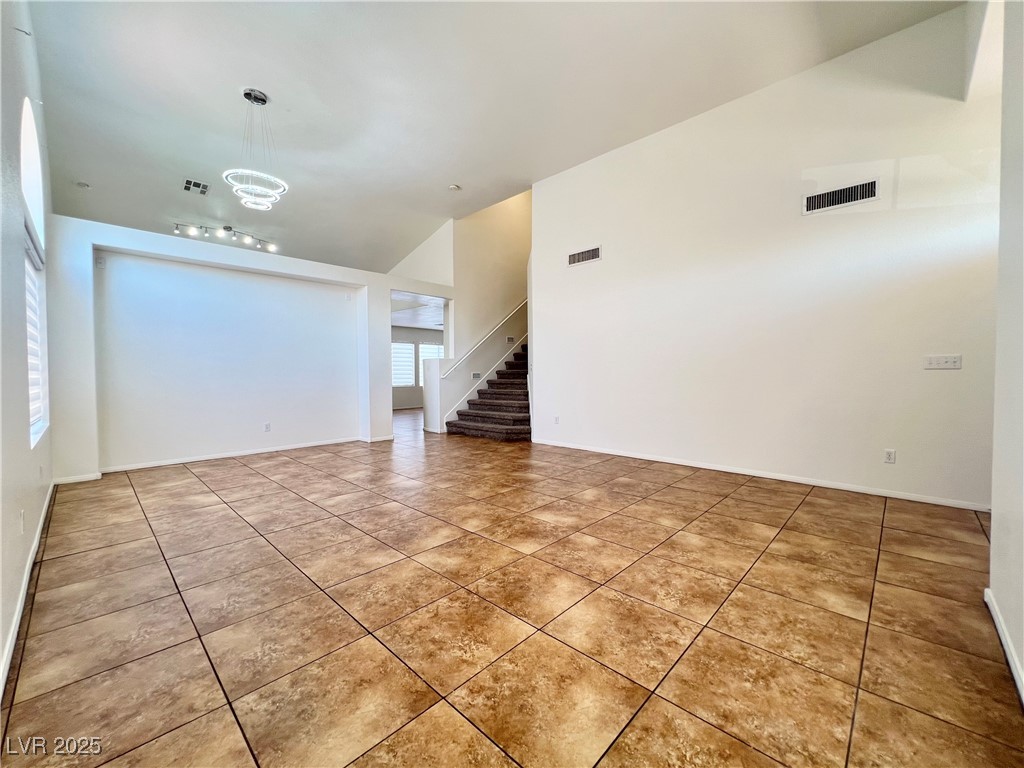 330 Forest Ridge Street Henderson, NV 89014 - Photo 9 of 45 Living and Dining Rooms with brand new contemporary LED light
