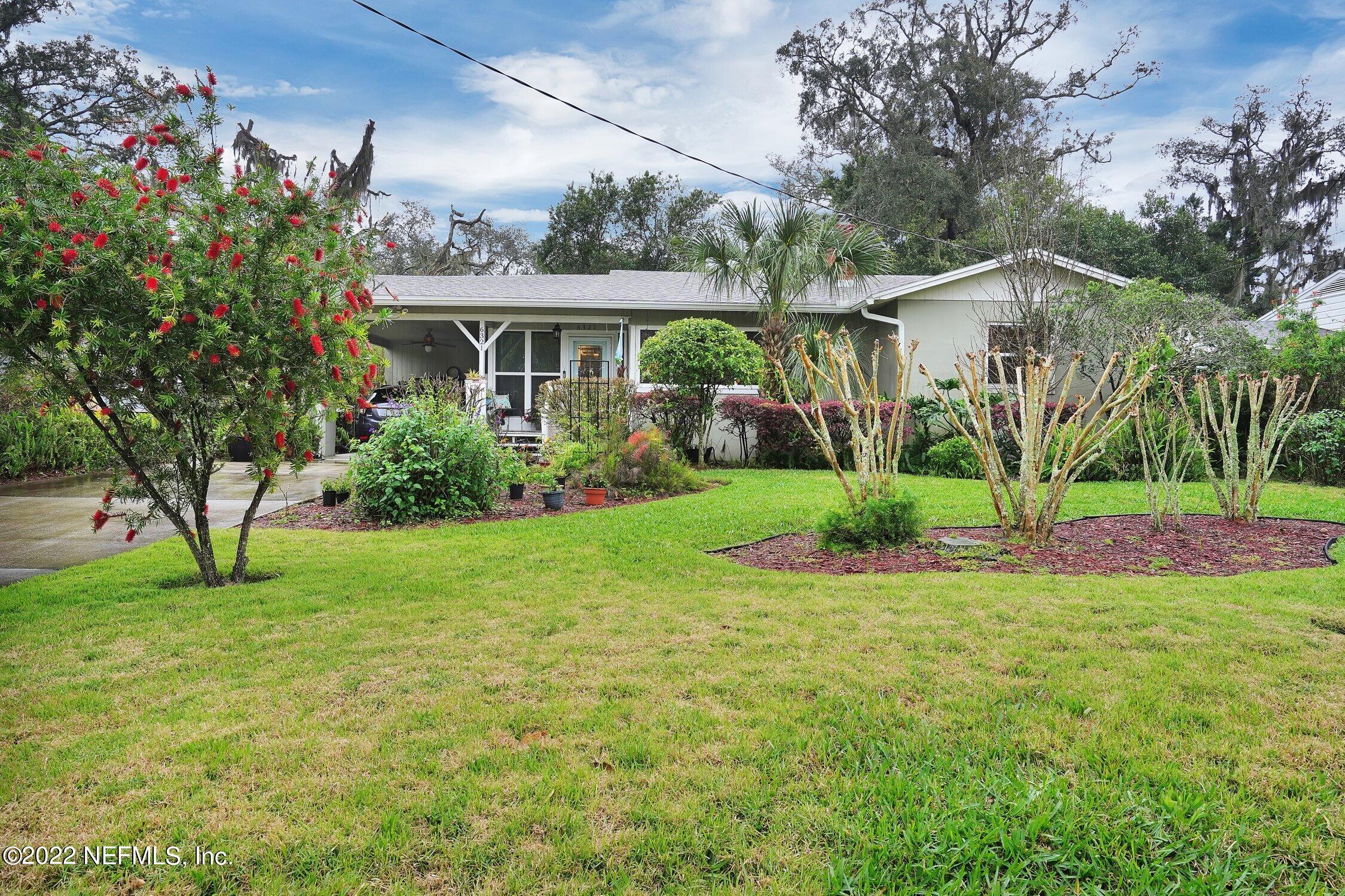 6321 Colgate Road Jacksonville, FL 32217 - Photo 2 of 27 a front view of a house with garden
