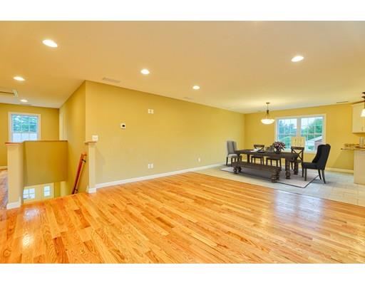 12 Woodland Road Springfield, MA 01129 - Photo 7 of 18 a view of a kitchen with furniture and wooden floor