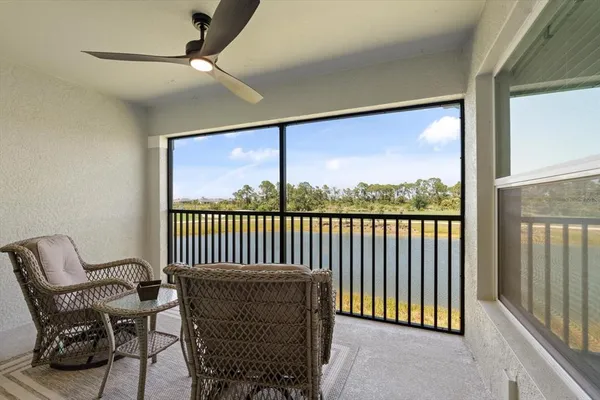 a front view of a house with a garden and plants