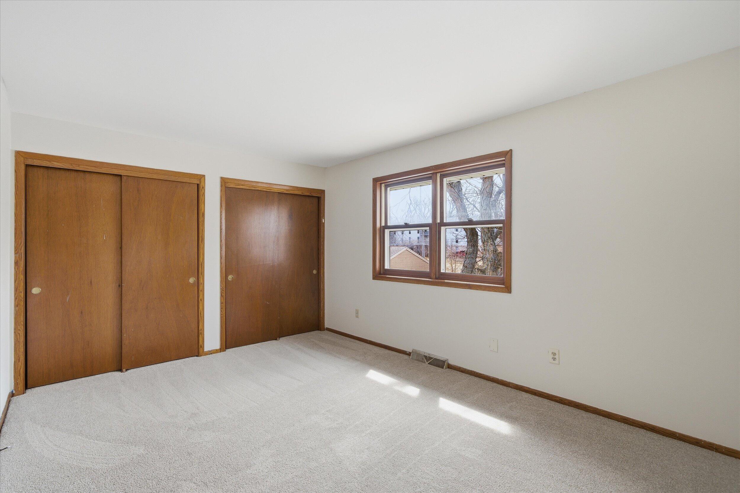 2017 Woodburn Road, Unit B Waukesha, WI 53188 - Photo 23 of 34 Primary Bedroom