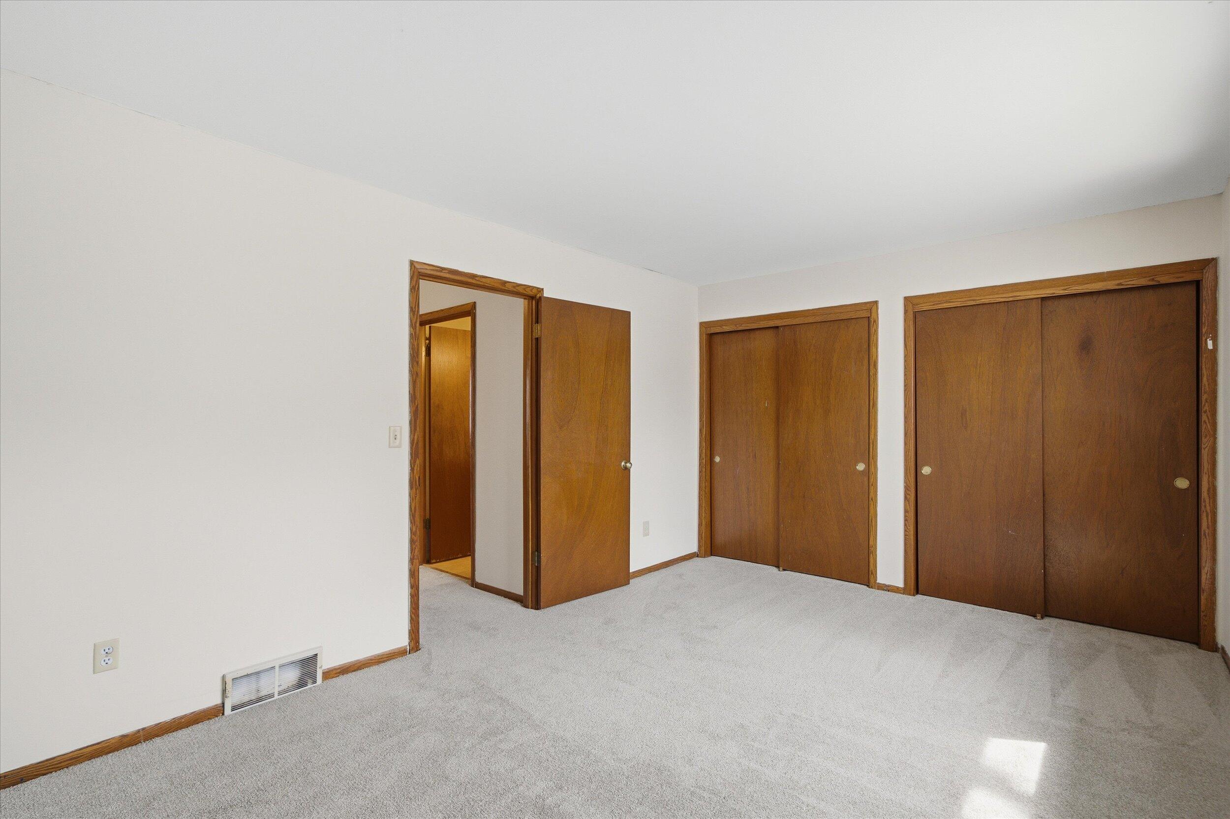 2017 Woodburn Road, Unit B Waukesha, WI 53188 - Photo 25 of 34 Primary Bedroom