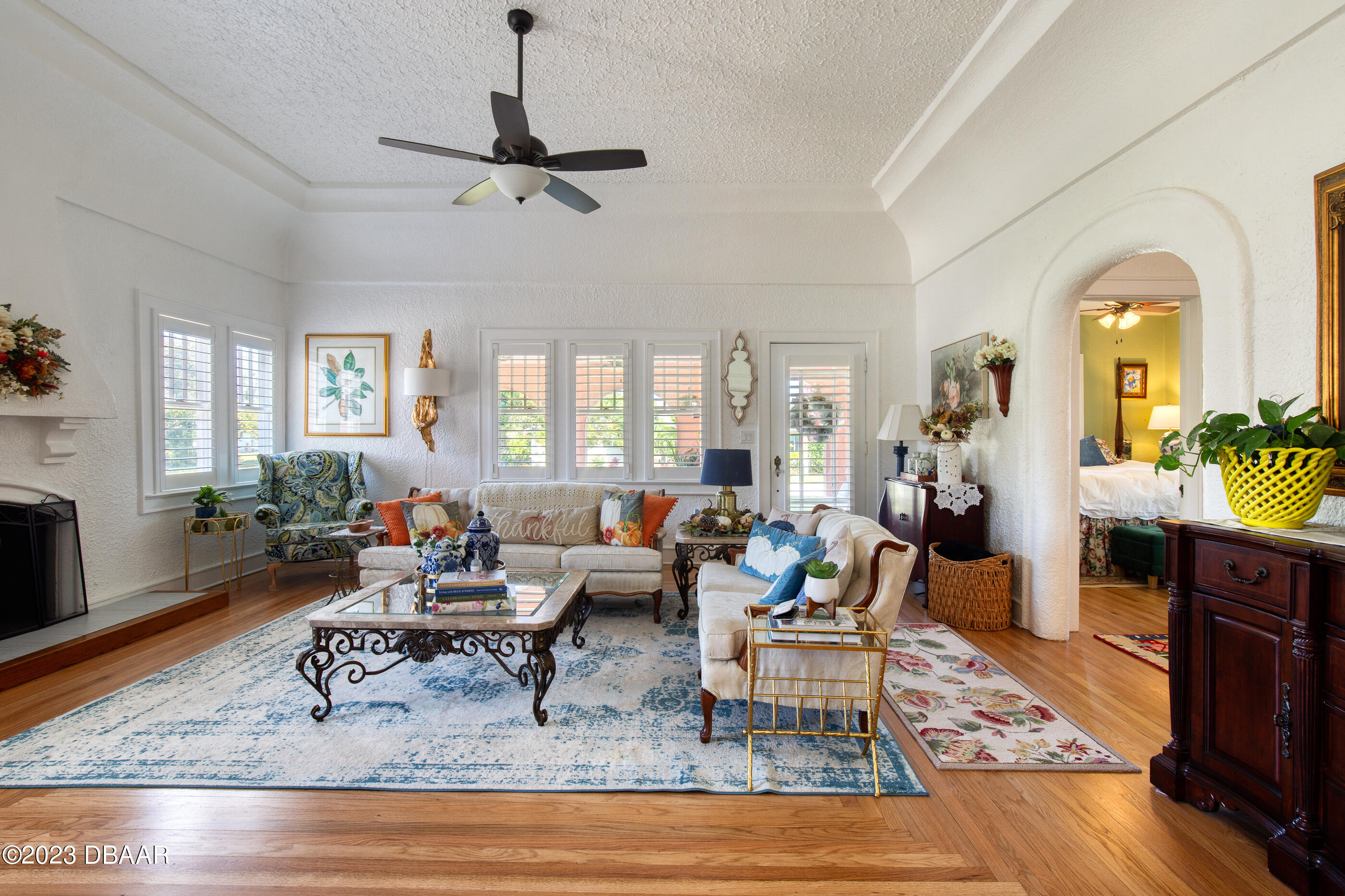 42 River Beach Drive Ormond Beach, FL 32176 - Photo 15 of 74 a living room with fireplace furniture and a rug