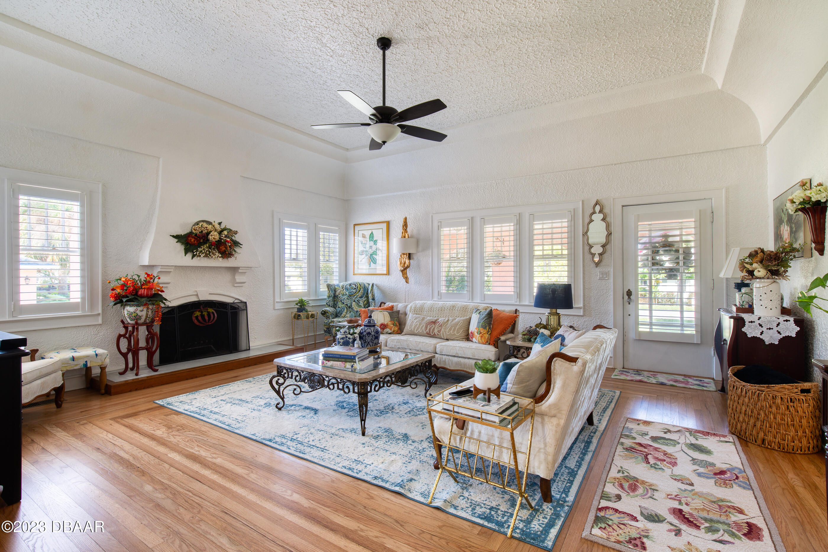 42 River Beach Drive Ormond Beach, FL 32176 - Photo 16 of 74 a living room with fireplace furniture and a fireplace