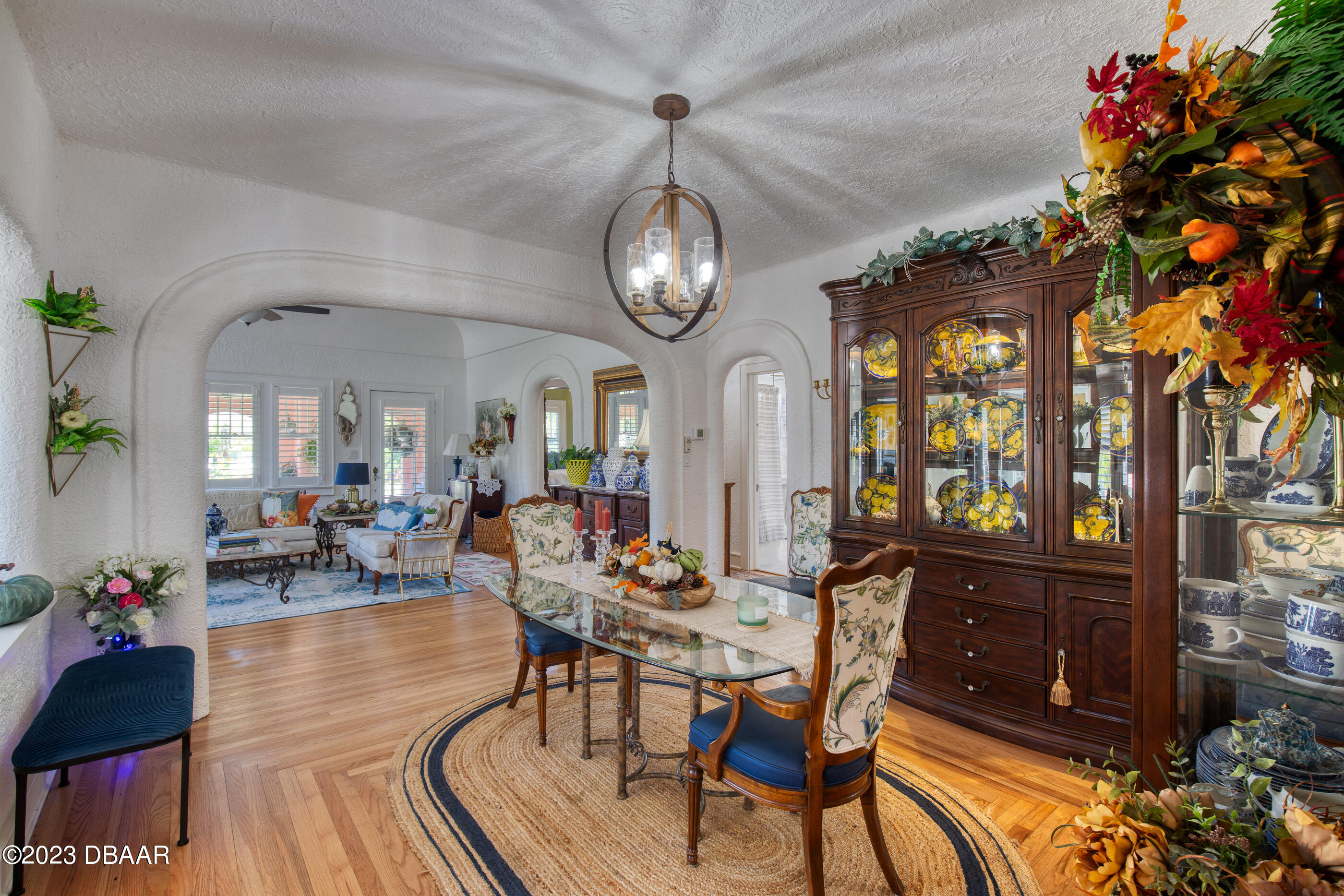 42 River Beach Drive Ormond Beach, FL 32176 - Photo 23 of 74 a view of a dining room with furniture window and wooden floor