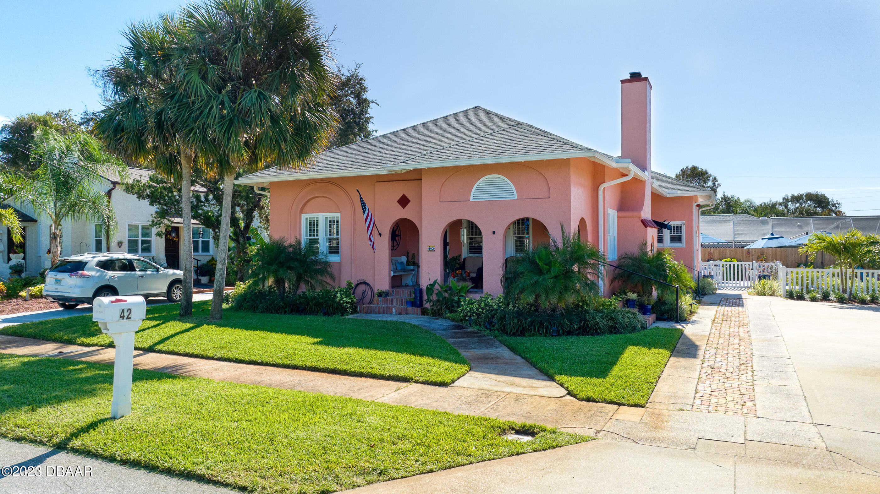 42 River Beach Drive Ormond Beach, FL 32176 - Photo 3 of 74 a view of a house with garden