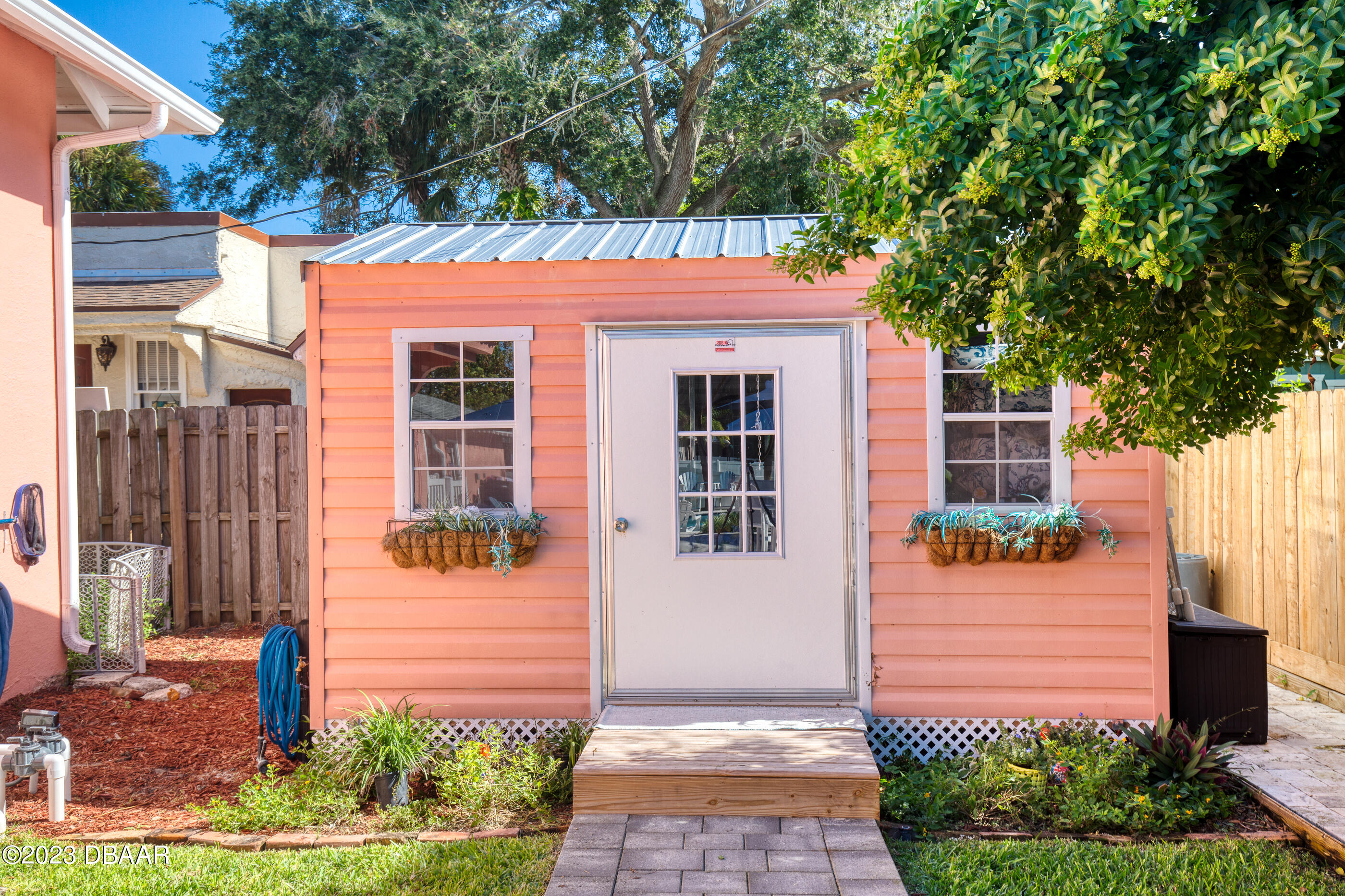 42 River Beach Drive Ormond Beach, FL 32176 - Photo 54 of 74 a front view of a house with a porch