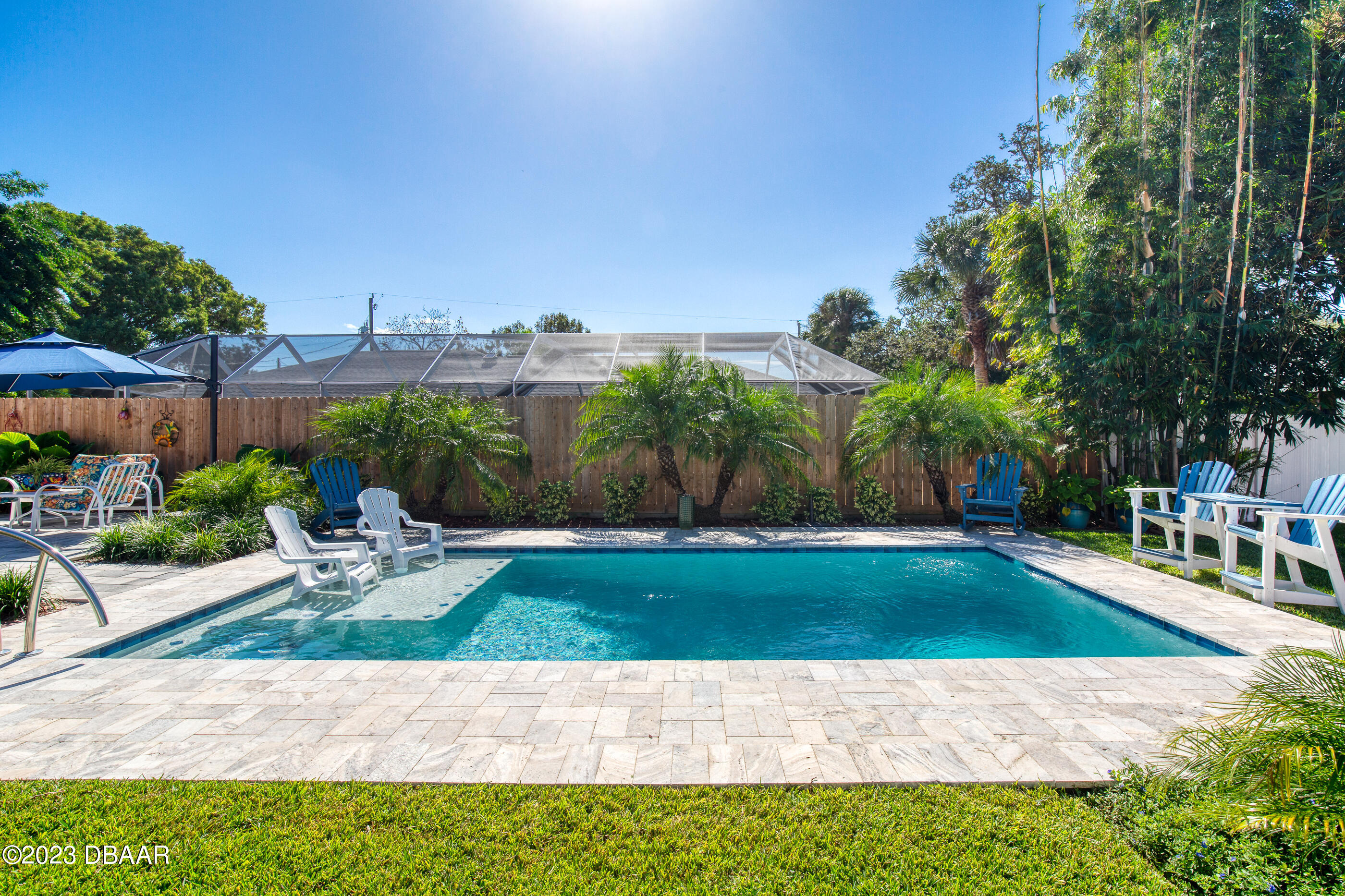 42 River Beach Drive Ormond Beach, FL 32176 - Photo 57 of 74 a view of a backyard with sitting area