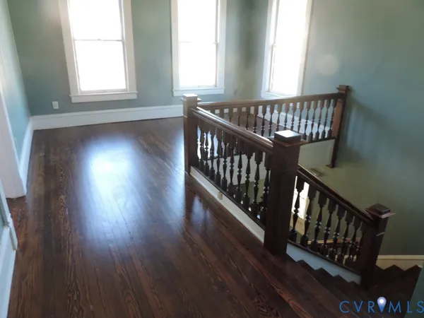wooden floor with windows