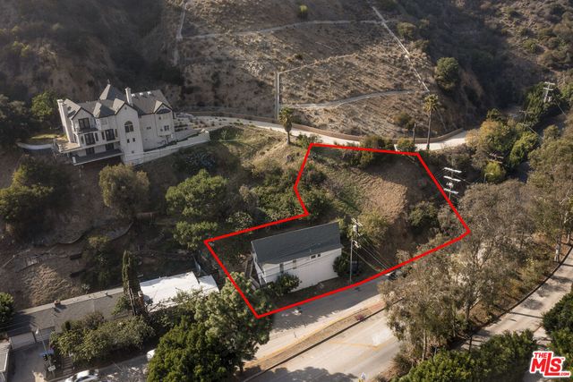 an outdoor space with wooden benches