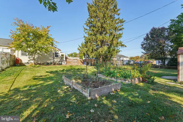 a view of a garden with an outdoor space