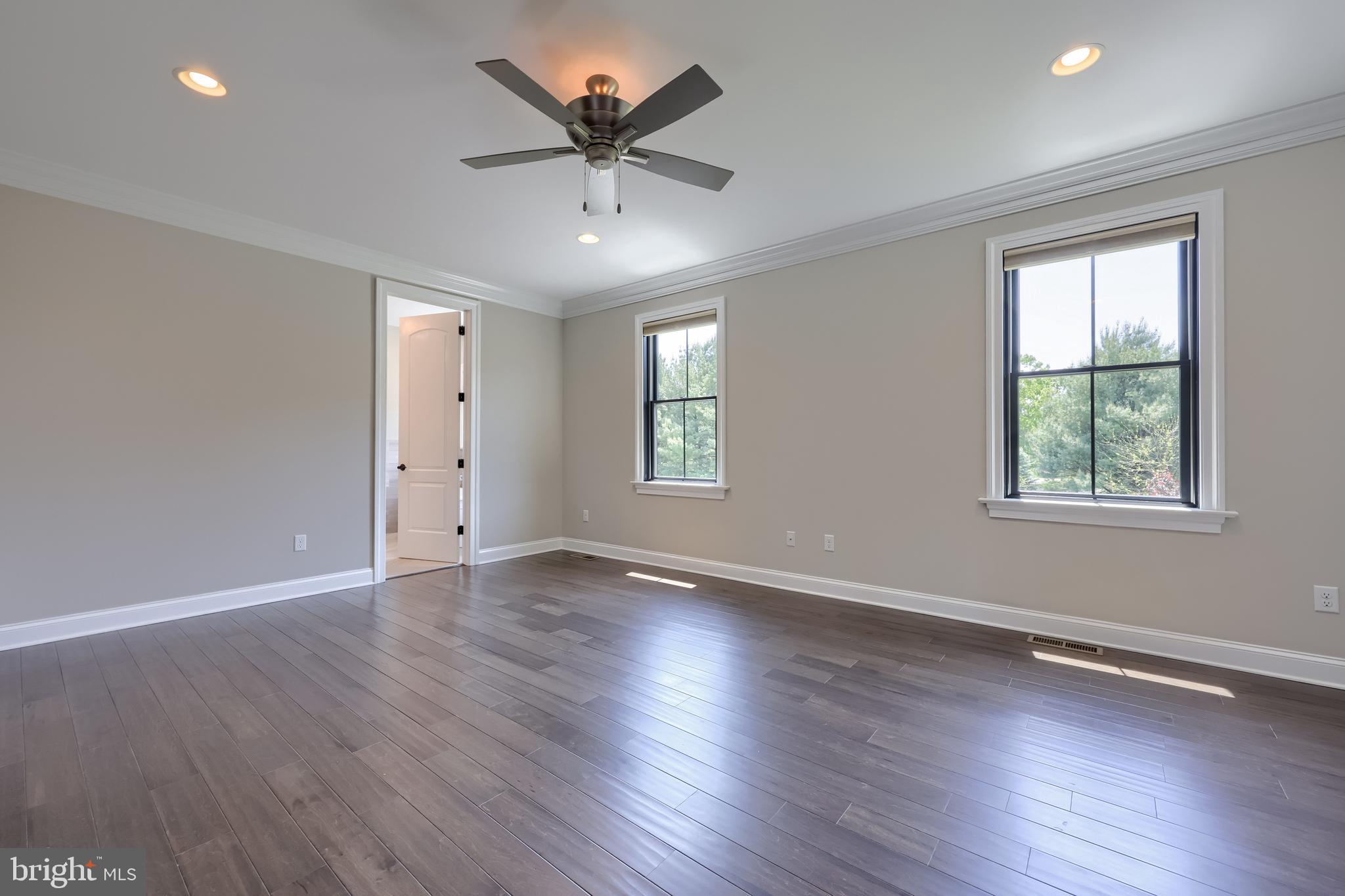 428 Southampton Drive Lititz, PA 17543 - Photo 36 of 60 an empty room with wooden floor and windows