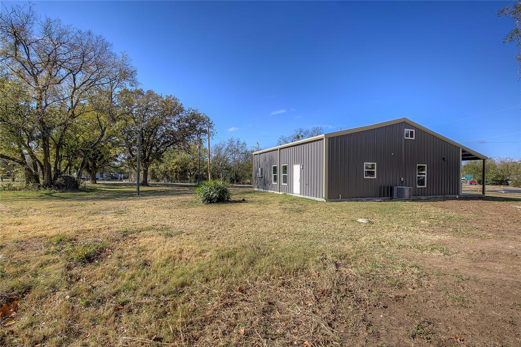 520 North 1st Street Point, TX 75472 - Photo 30 of 34 a view of a house with a yard