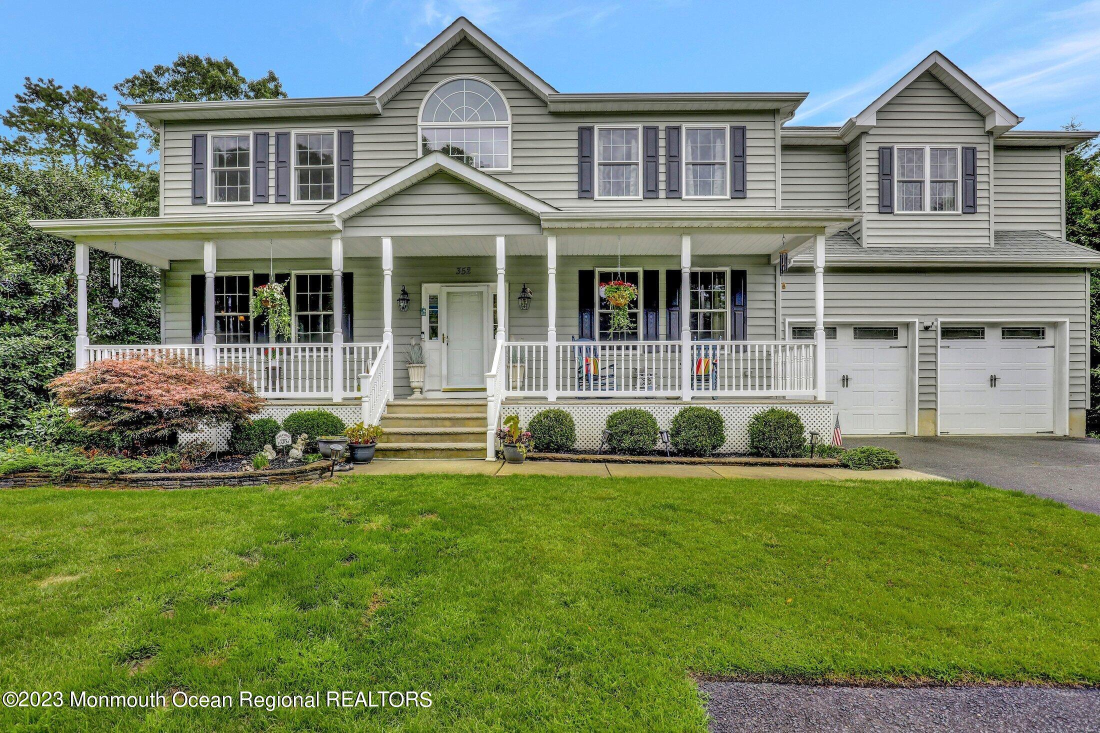 352 Lanes Pond Road Howell, NJ 07731 - Photo 1 of 67 a view of a house with a yard